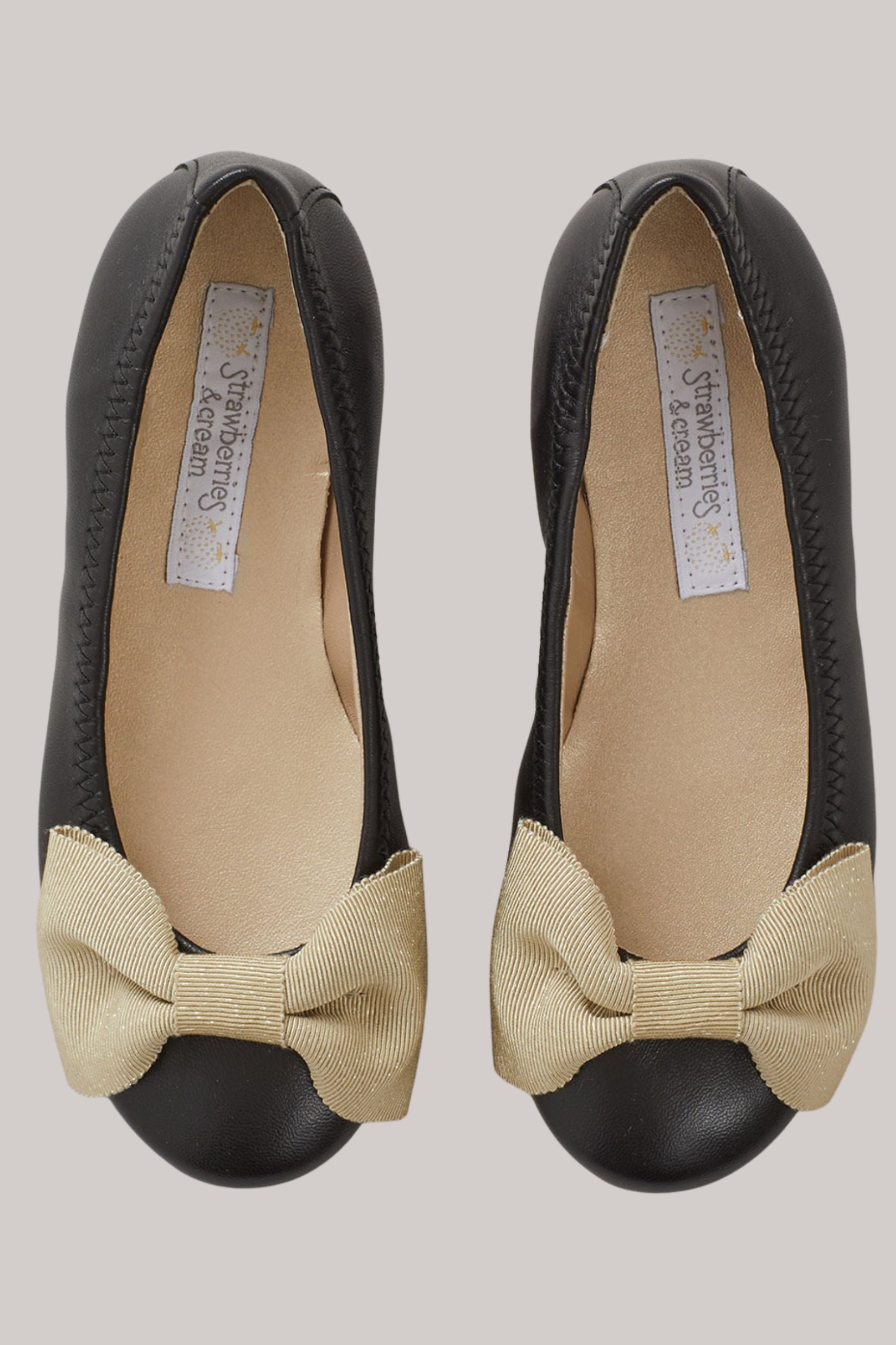 Ballerina Bow - Black - Gold Bow - Strawberries &amp; Cream - Ingrid Lewis - Designer 
Black flats with beige bow details.