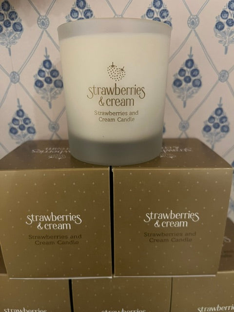 Candle labeled 'Strawberries & Cream' with packaging on a patterned surface
Candle - Strawberries & Cream candle -Strawberries and Cream -  Ingrid Lewis 