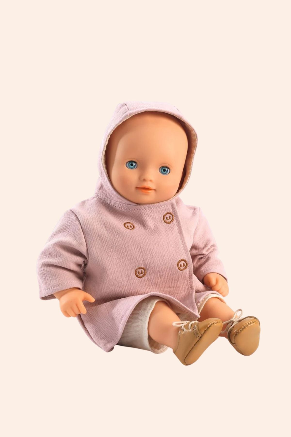 Djeco - Pomea - Hooded Coat - Strawberries & Cream 
Baby doll wearing a pink outfit with buttons.
