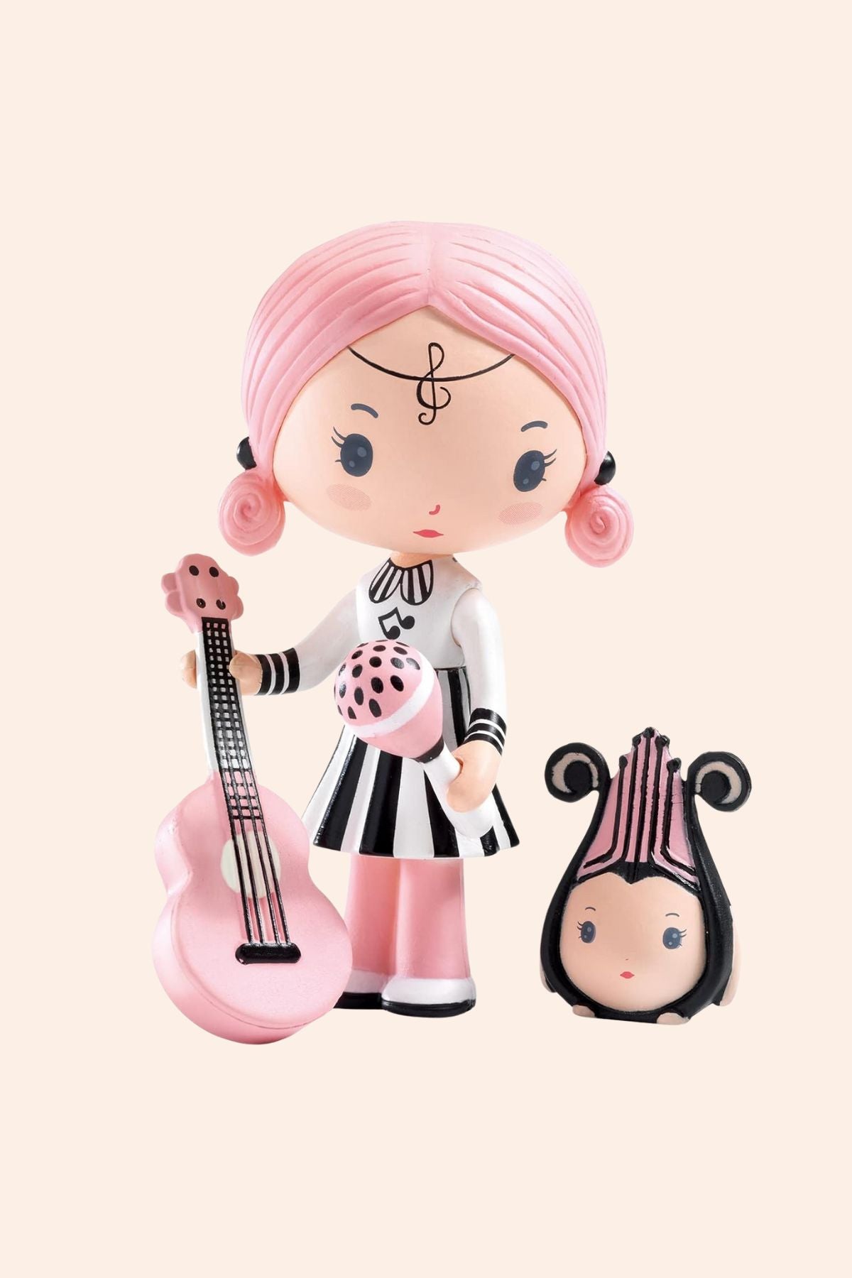 Djeco - Sidonie & Zick - Tinyly - Strawberries & Cream- Collect them all - Characters - Figurines - Ingrid Lewis - Designer 
Toy figure with pink hair and black and white outfit holding a pink guitar