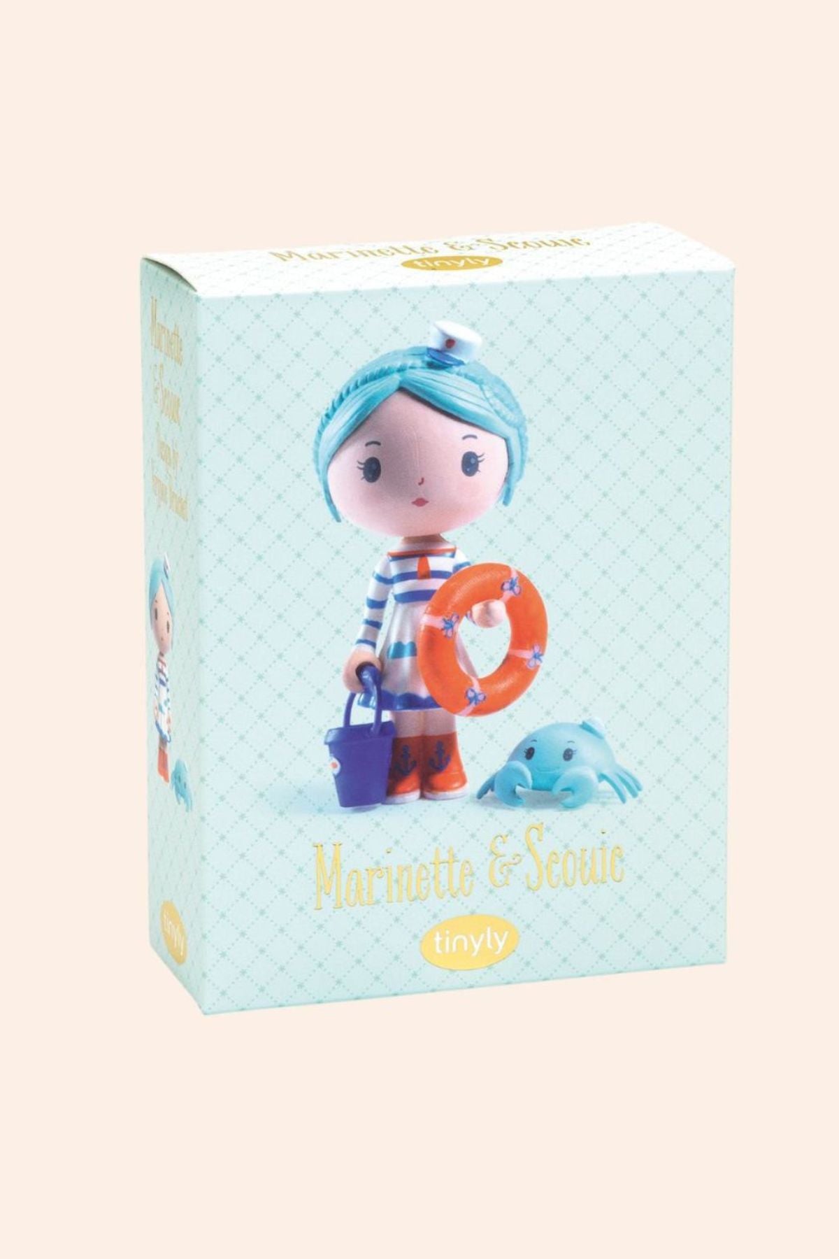 Djeco - Tinyly - Marinette & Scouic doll - Strawberries & Cream - Collectables - Friendship - Dolls - Ingrid Lewis - Designer 
Toy packaging with a character holding an orange life buoy and a blue fish.
