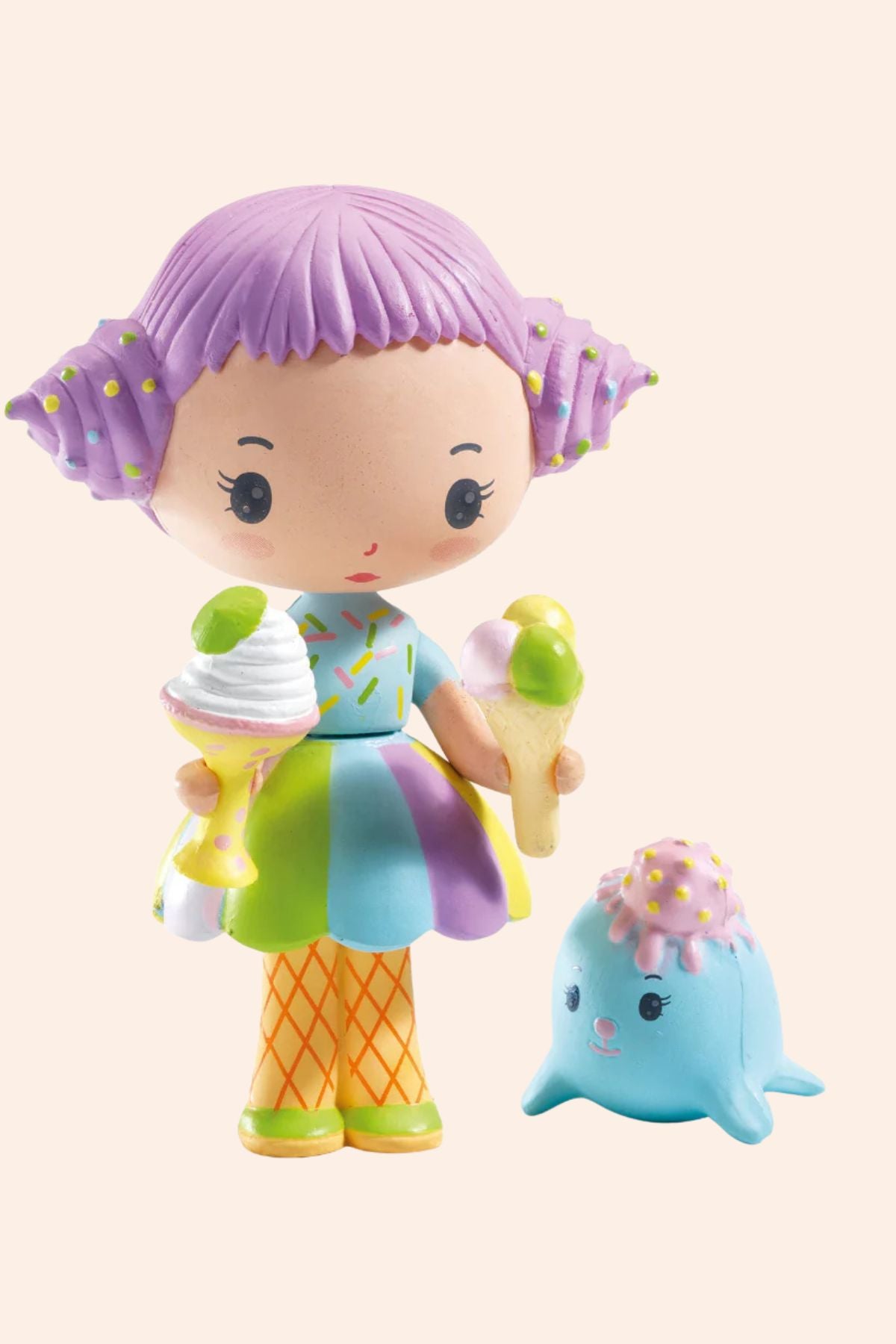 Djeco - Tinyly - Tutti & Frutti - Strawberries & Cream - Ingrid Lewis - Designer
Colourful toy figure with purple hair holding ice cream cones