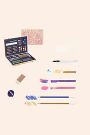Art supplies including a color box, markers, and pencils on a light beige background
