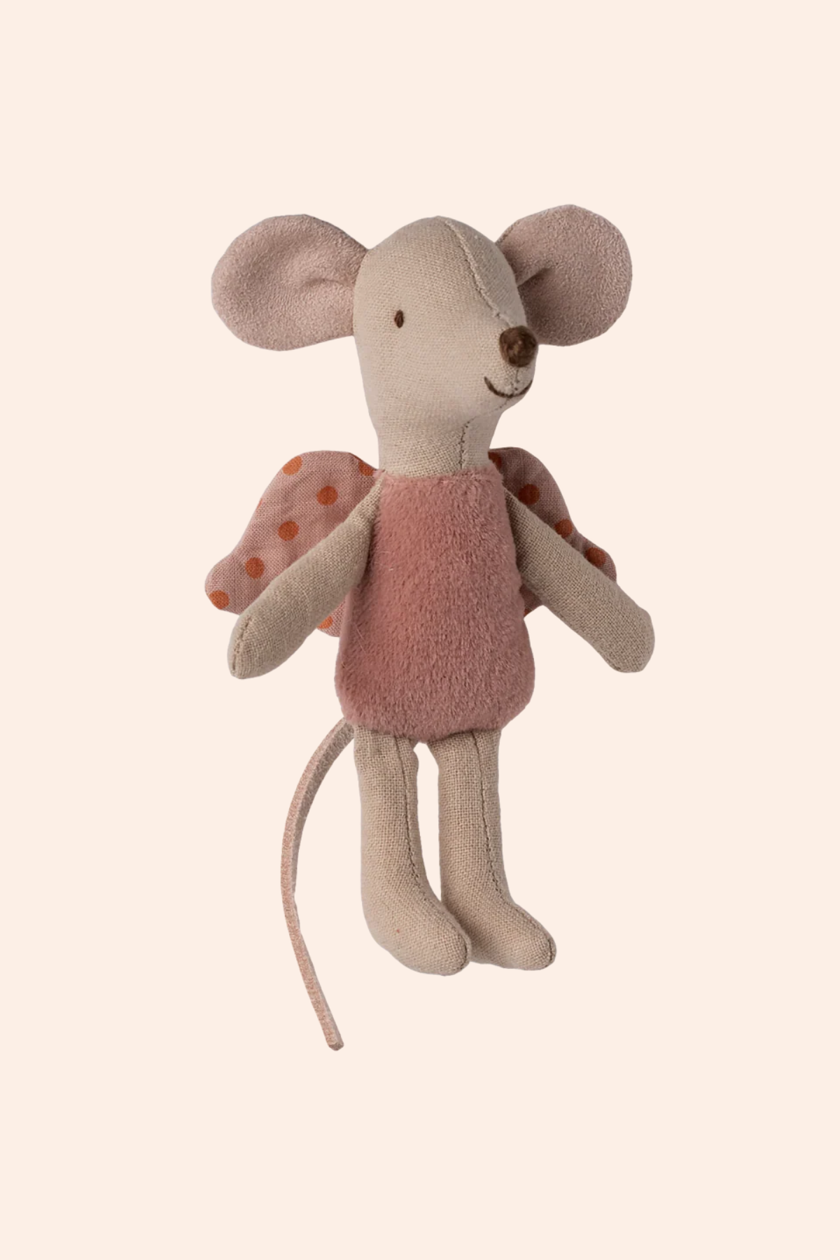 Stuffed mouse toy with a pink outfit and butterfly wings on a white background