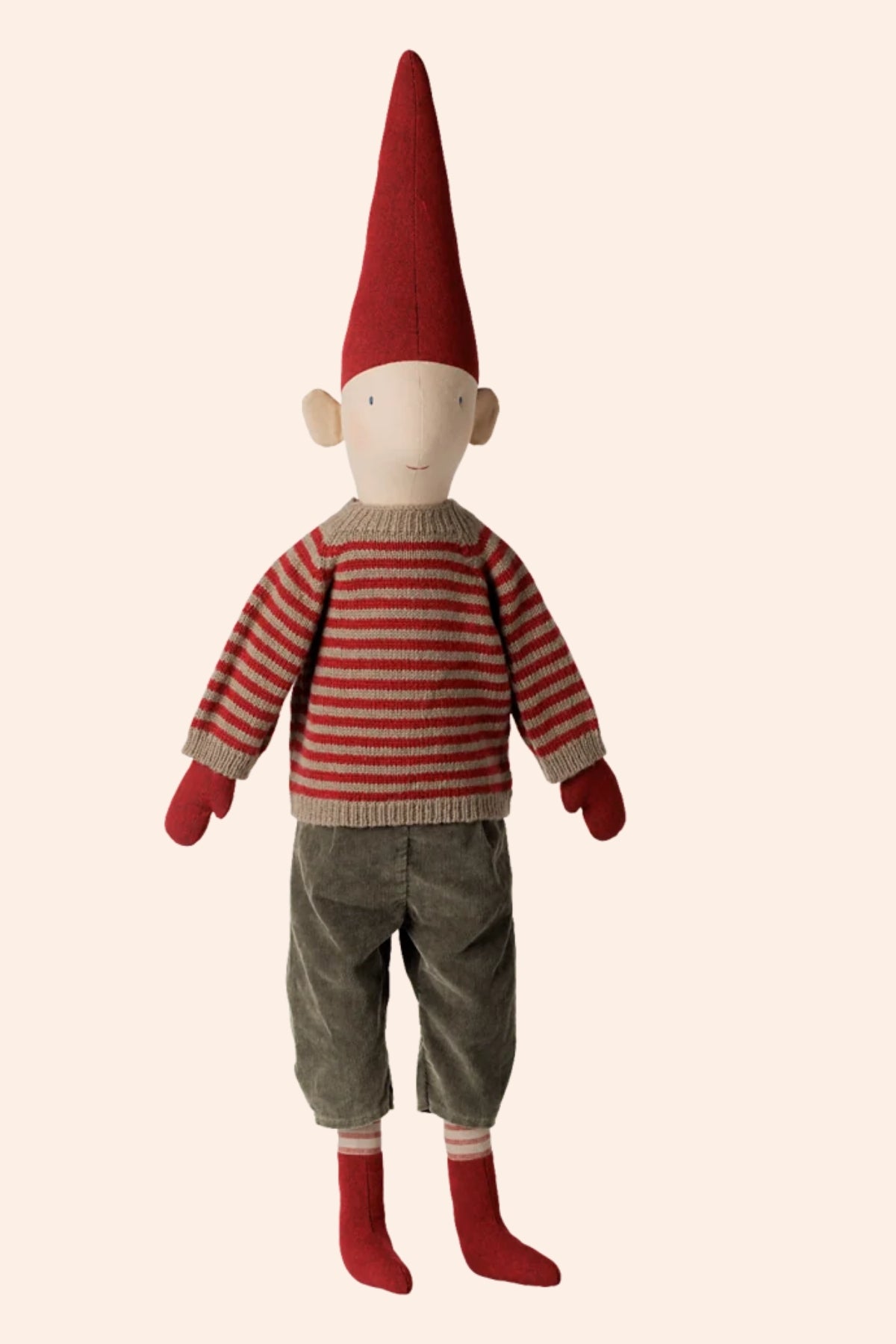 Maileg - Pixy Size 5 - Boy Striped Knitted Sweater - Strawberries and Cream - Ingrid Lewis - Designer
A stylized doll or plush figure with a tall red pointed hat, a red-and-cream striped sweater, gray pants, and red socks, centered on a plain warm beige background.