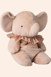 Plush elephant toy with a ruffled collar on a white background