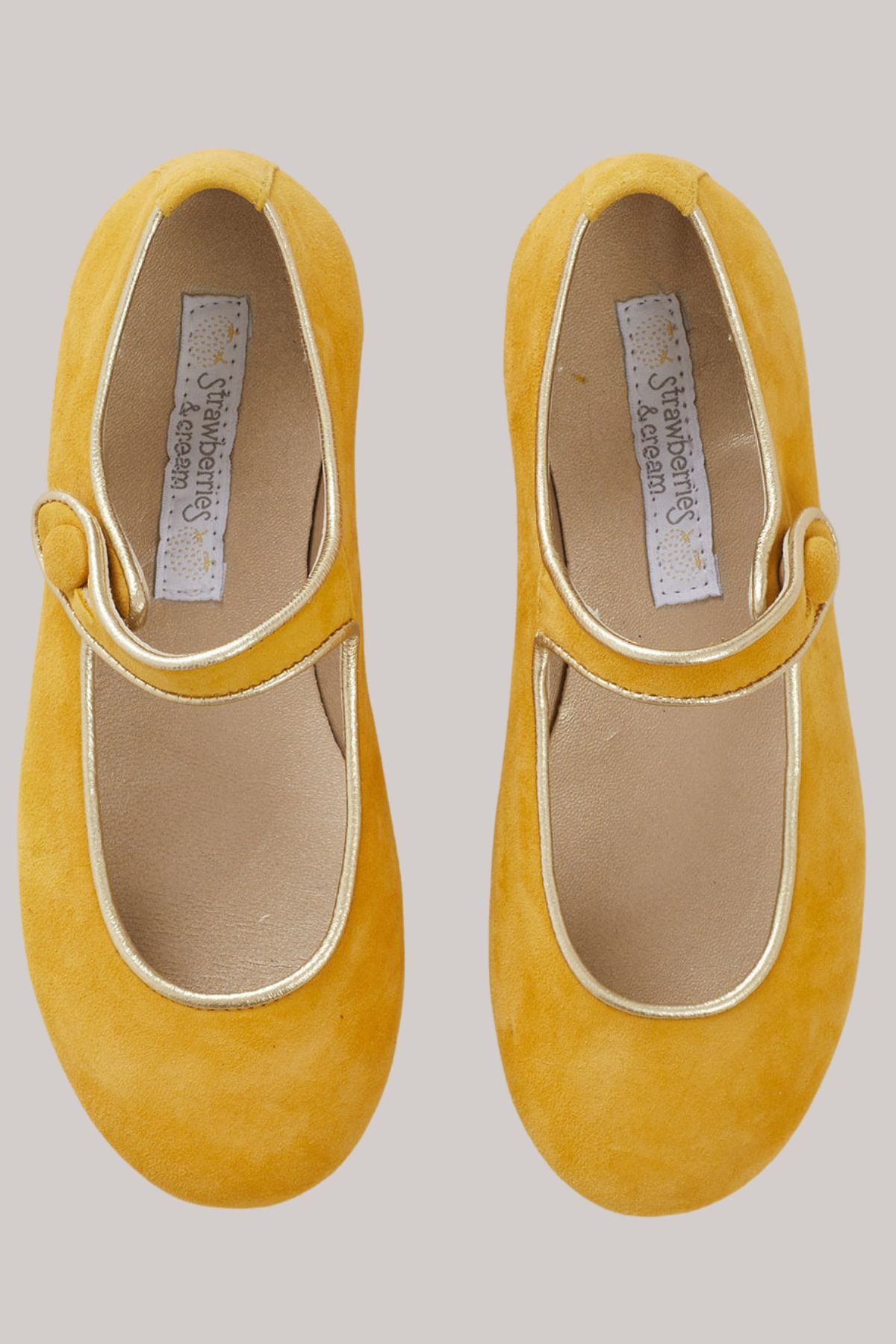 Mary Jane - Suede Mustard - Strawberries & Cream - Ingrid Lewis - Designer
Pair of yellow leather children's shoes