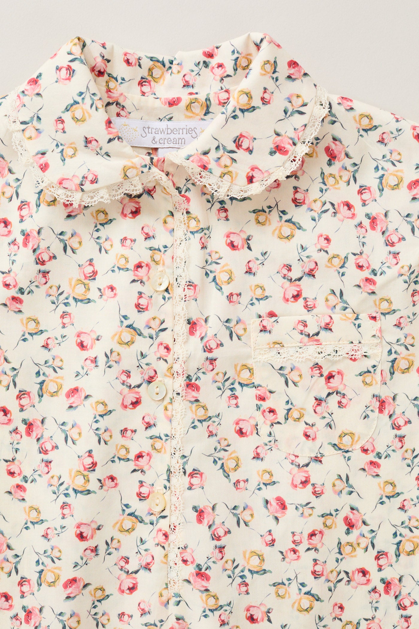 Baby Pyjama in Cream Rosebuds