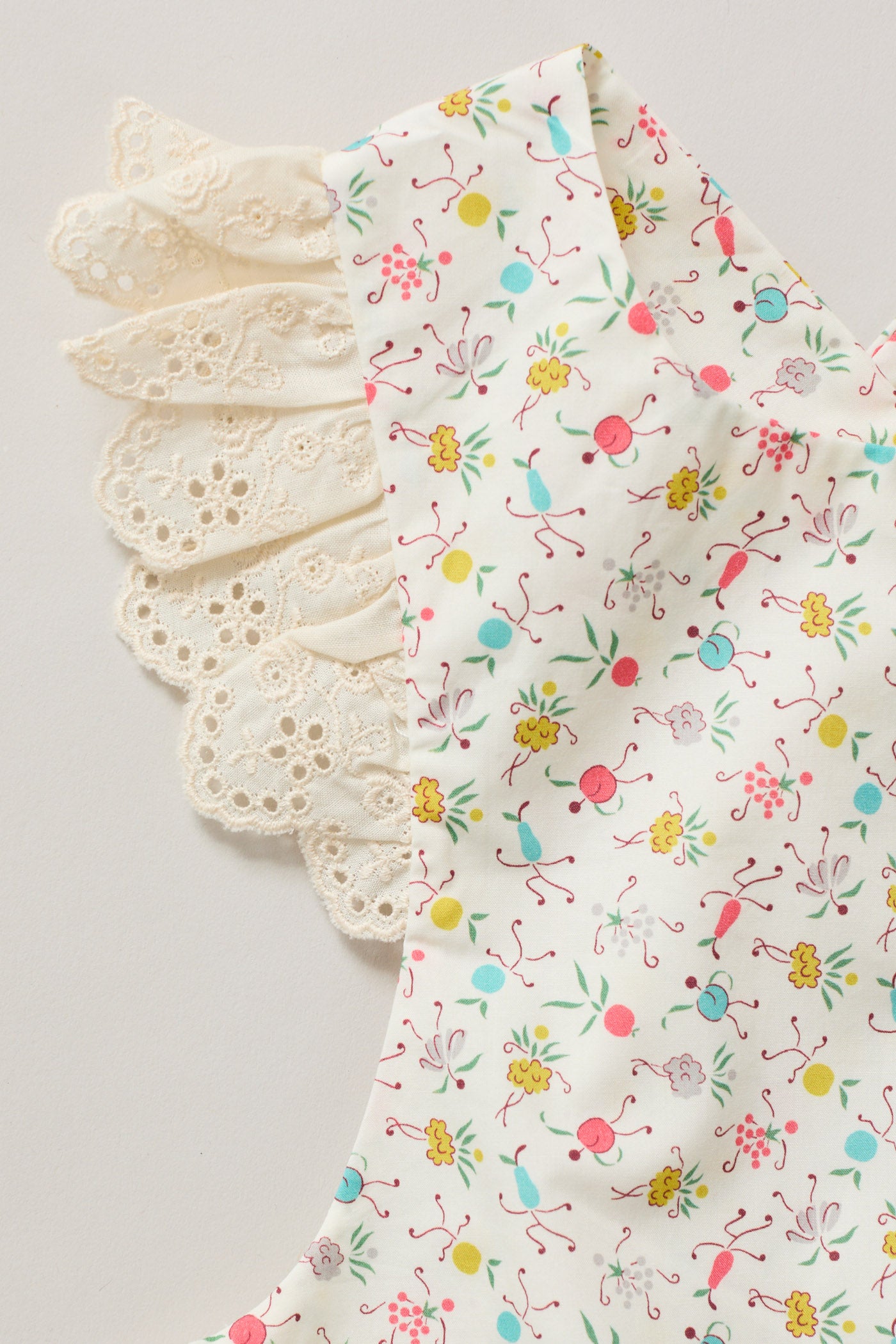 Baby Lace Pinafore in Happy Print