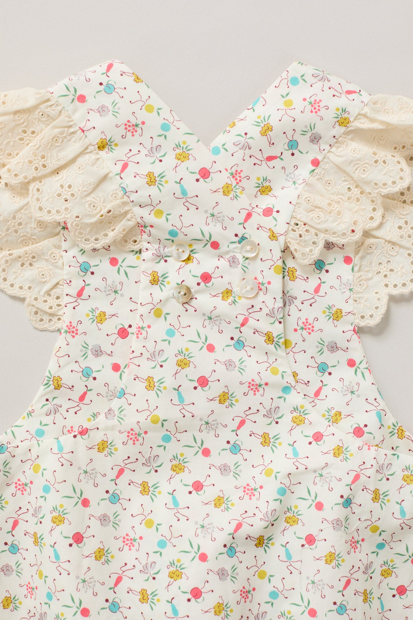 Baby Lace Pinafore in Happy Print