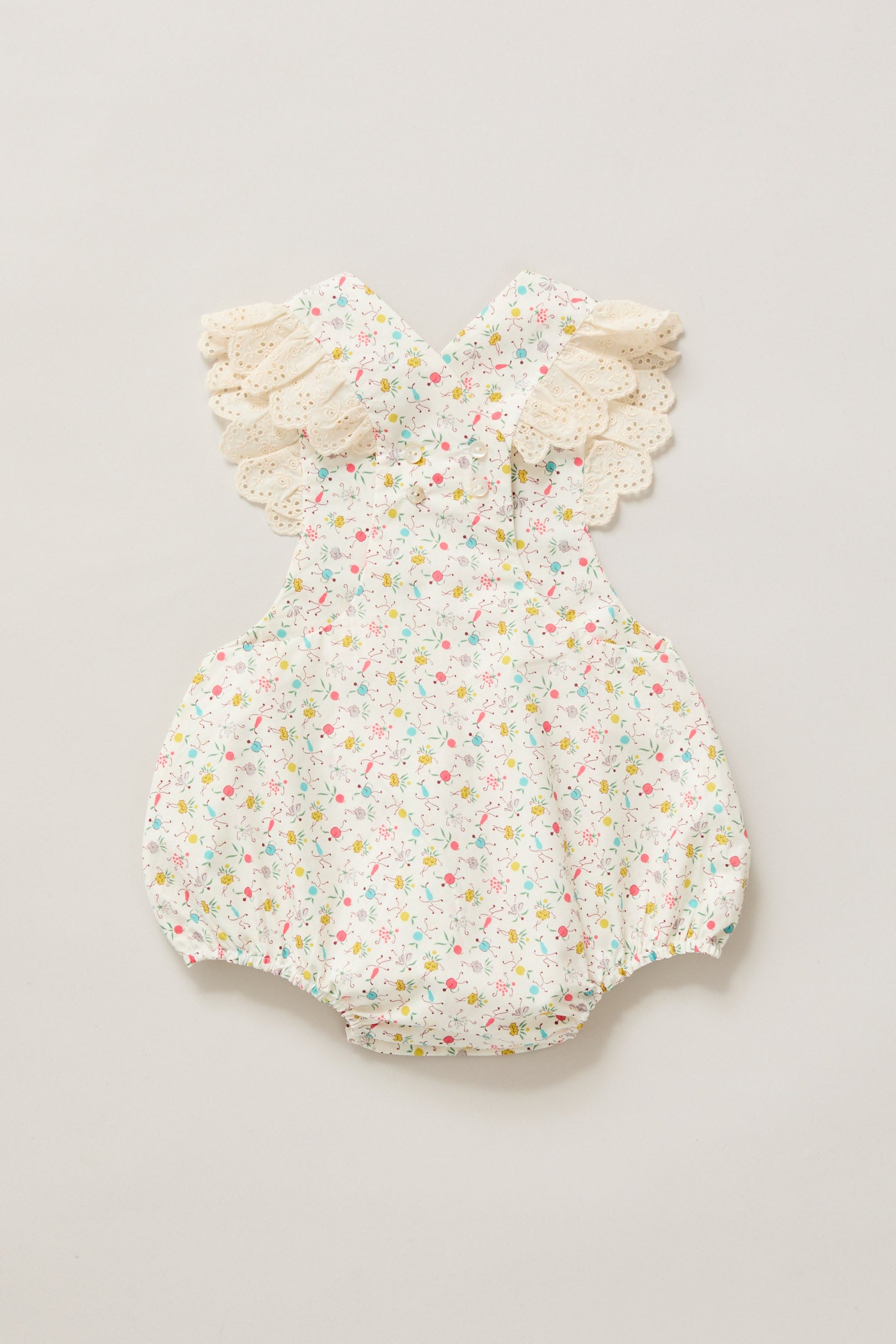 Baby Lace Pinafore in Happy Print
