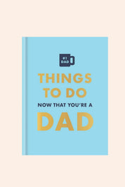 Things To Do Now That You're A DAD - Strawberries & Cream - Ingrid Lewis - Designer
Book titled 'Things to Do Now That You're a Dad' with '#1 Dad' badge on blue cover