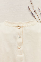 Cream sponge body with lace trim, jersey/T shirt
